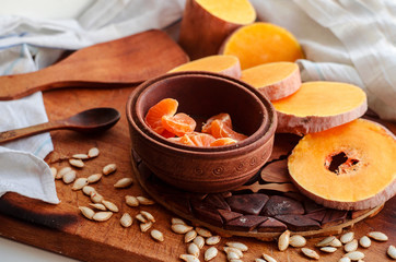 rustic dessert of pumpkin and mandarins