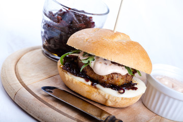 Hamburger with onion chutney and cheese