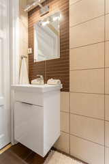 Corner of a tiled bathroom