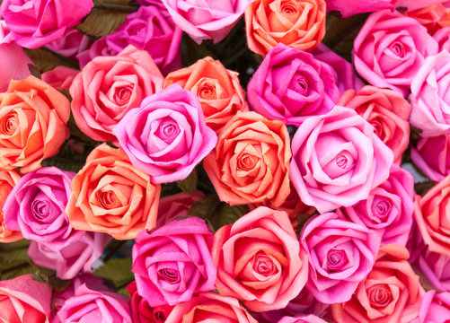 A bouquet of pink roses made of colored paper. 