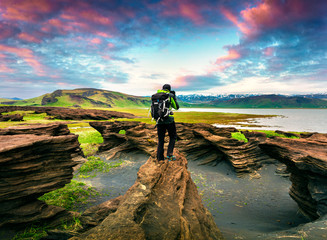 Photographer take a picture of sunset