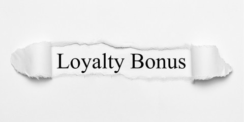 Loyalty Bonus on white torn paper