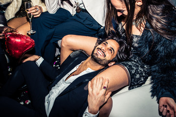 Party people celebrating in the club