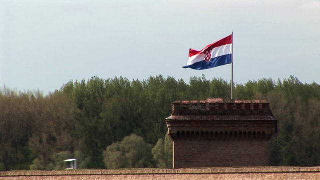 Croatian flag moving in the wind over Osijek