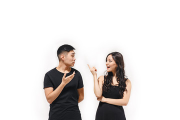 Fototapeta premium Portrait of smiling Korean couple isolated on white