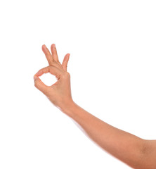 Woman hand with gesturing ok sign isolated
