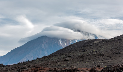 Volcano Ostry Tolbachik in the clouds - Kamchatka, Russia