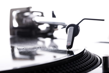 DJ headshell on spinning record