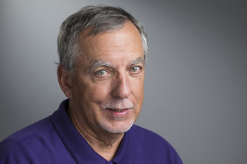 Portrait of a senior aged man smiling