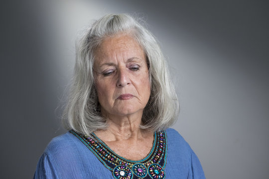 Portrait of a sad, senior aged woman