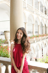 Girl in red costume posing