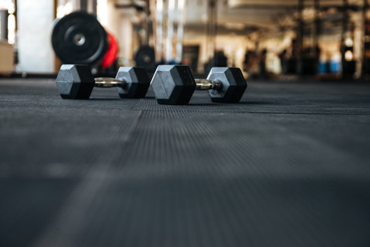 Dumbbells On The Floor In Gym