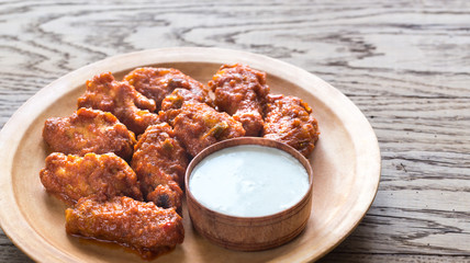 Fried chicken wings with blue cheese sauce