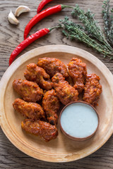 Fried chicken wings with blue cheese sauce