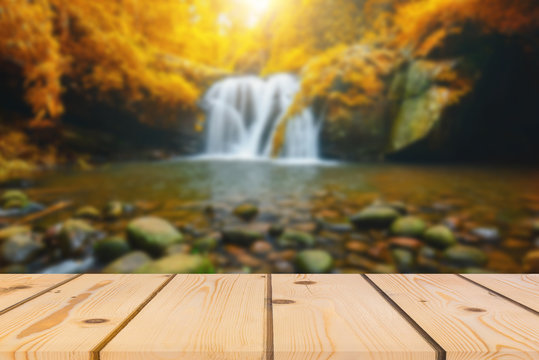 Wood Floor Perspective And Natural Mountain Waterfall