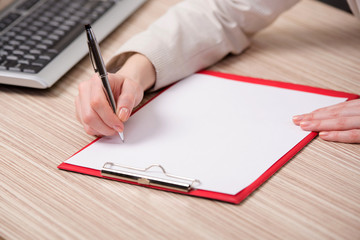 Hand writing memo in business concept
