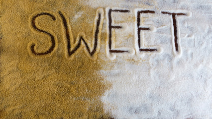 Top view of sweet inscription on white and brown sugar grain