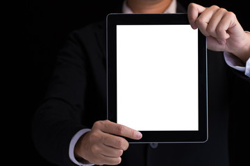 A business man holding blank digital tablet showing copy space