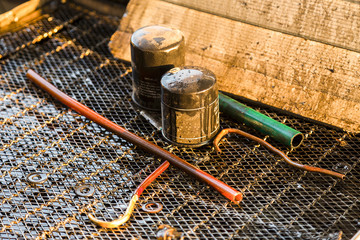Close up old and dirty car oil filter. (Selective Focus)