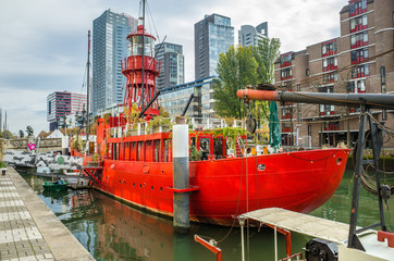 Fototapeta na wymiar Historic vessel near Maritiem Museum Rotterdam, Netherlands