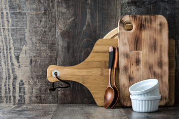 Fototapeta na wymiar Cooking utensils on wooden background 