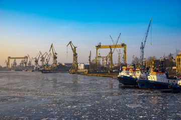 Fototapeta premium tugboats in the frozen port