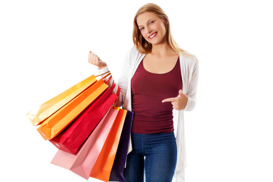 Beauty hhopping woman holding bags