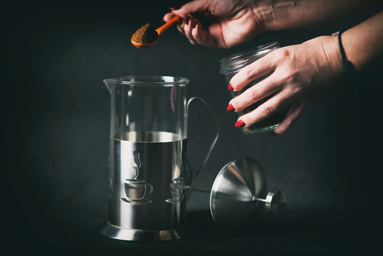 Preparing the coffee brew.
