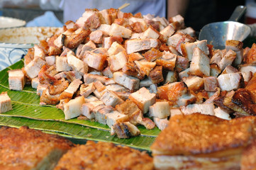 Stack of crispy pork in market,