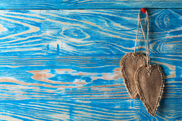 Heart made of cloth on wood desk