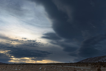 Dramatic sky beautiful winter landscape with a mountain. Russia, Stary Krym.