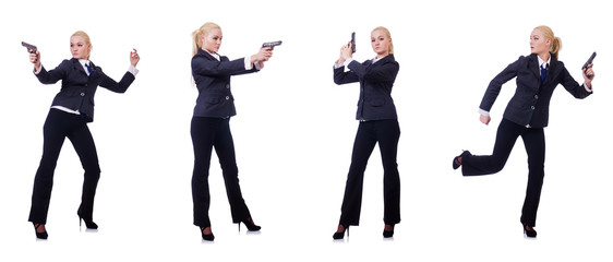 Woman with gun isolated on white