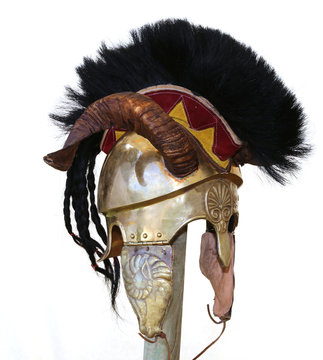 Ancient helmet of a soldier with horn and metal decorations