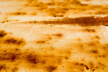 Rusty cracked steel texture, selective focus