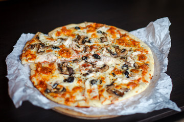 pizza on black background