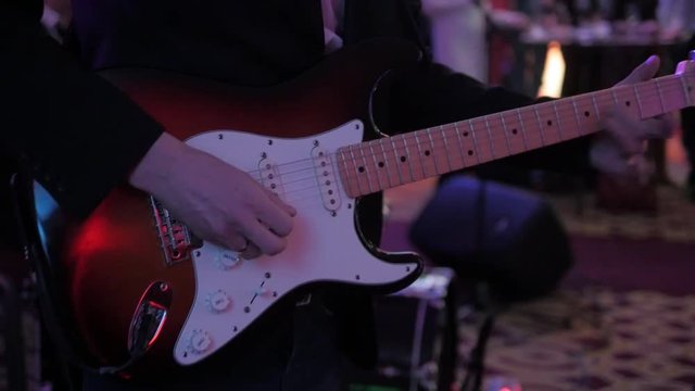 Male Hands Playing of Guitar on The Party, Slow Motion Close - Up Shot