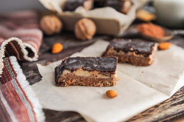 Homemade healthy snack sweets - energy nut bars. Sugar-free, gluten-free, without baking. Selective focus