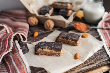 Homemade healthy snack sweets - energy nut bars. Sugar-free, gluten-free, without baking. Selective focus