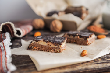 Homemade healthy snack sweets - energy nut bars. Sugar-free, gluten-free, without baking. Selective...
