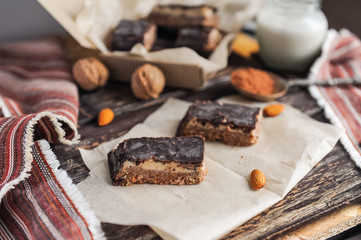 Homemade healthy snack sweets - energy nut bars. Sugar-free, gluten-free, without baking. Selective focus