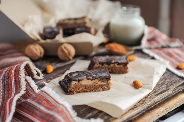 Homemade healthy snack sweets - energy nut bars. Sugar-free, gluten-free, without baking. Selective focus