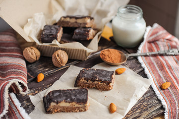 Homemade healthy snack sweets - energy nut bars. Sugar-free, gluten-free, without baking. Selective focus
