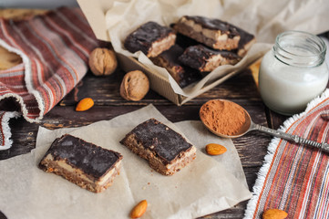 Homemade healthy snack sweets - energy nut bars. Sugar-free, gluten-free, without baking. Selective focus