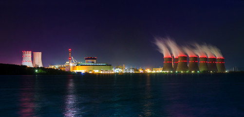 Night view of cooling towers of the Novovoronezh nuclear power plant from the co