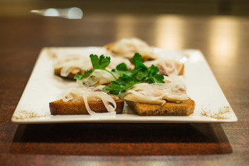 Toasts with herring