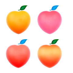 heart shaped peaches isolated on white background