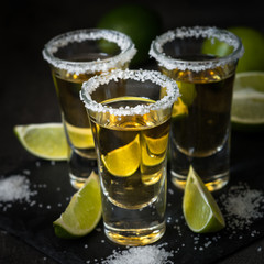 Tequila shot with lime and sea salt