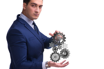 Businessnman in teamwork concept with cogwheels