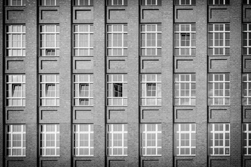 Old red brick industry building facade, Berlin, Germany, Europe, Black and white
