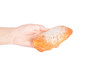 Fresh bun in his hand isolated 